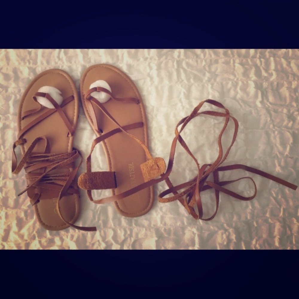 Tan lace up gladiator flip flop sandals